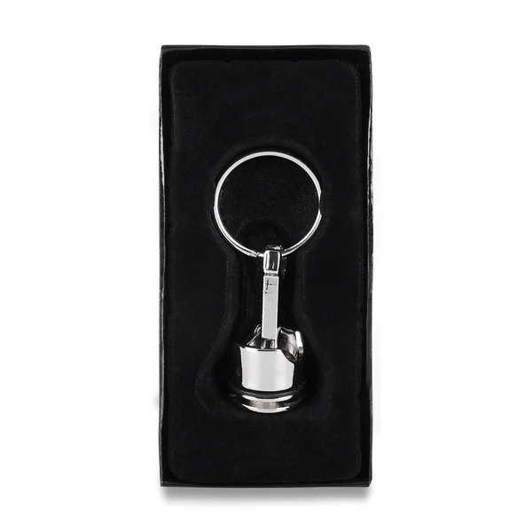 Nyckelring i metall Piston