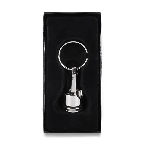 Nyckelring i metall Piston